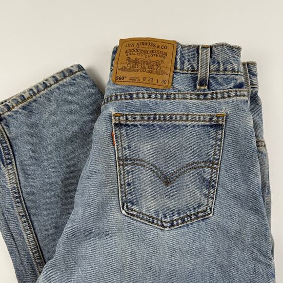 Vintage Levis 560 Light Blue Denim Faded Jeans 90s Orange Tab Fits like 32x28 - Picture 2 of 10